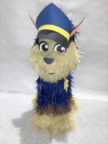 Piñata en forme de chien policier de  pat patrouille brun et bleu