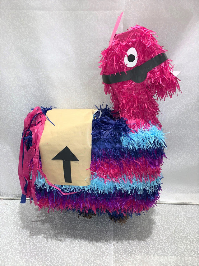 Piñata en forme de llama coloré fushia et bleu
